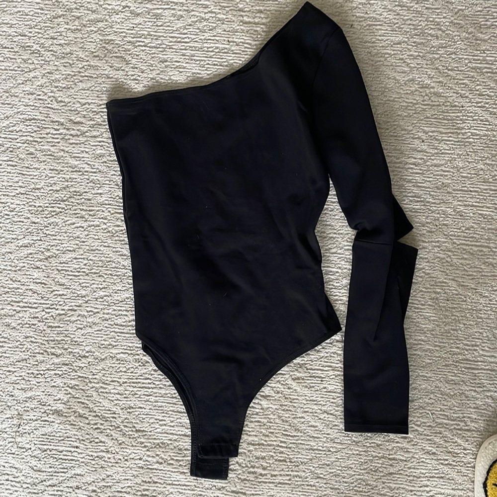 Kittenish one shoulder body suit